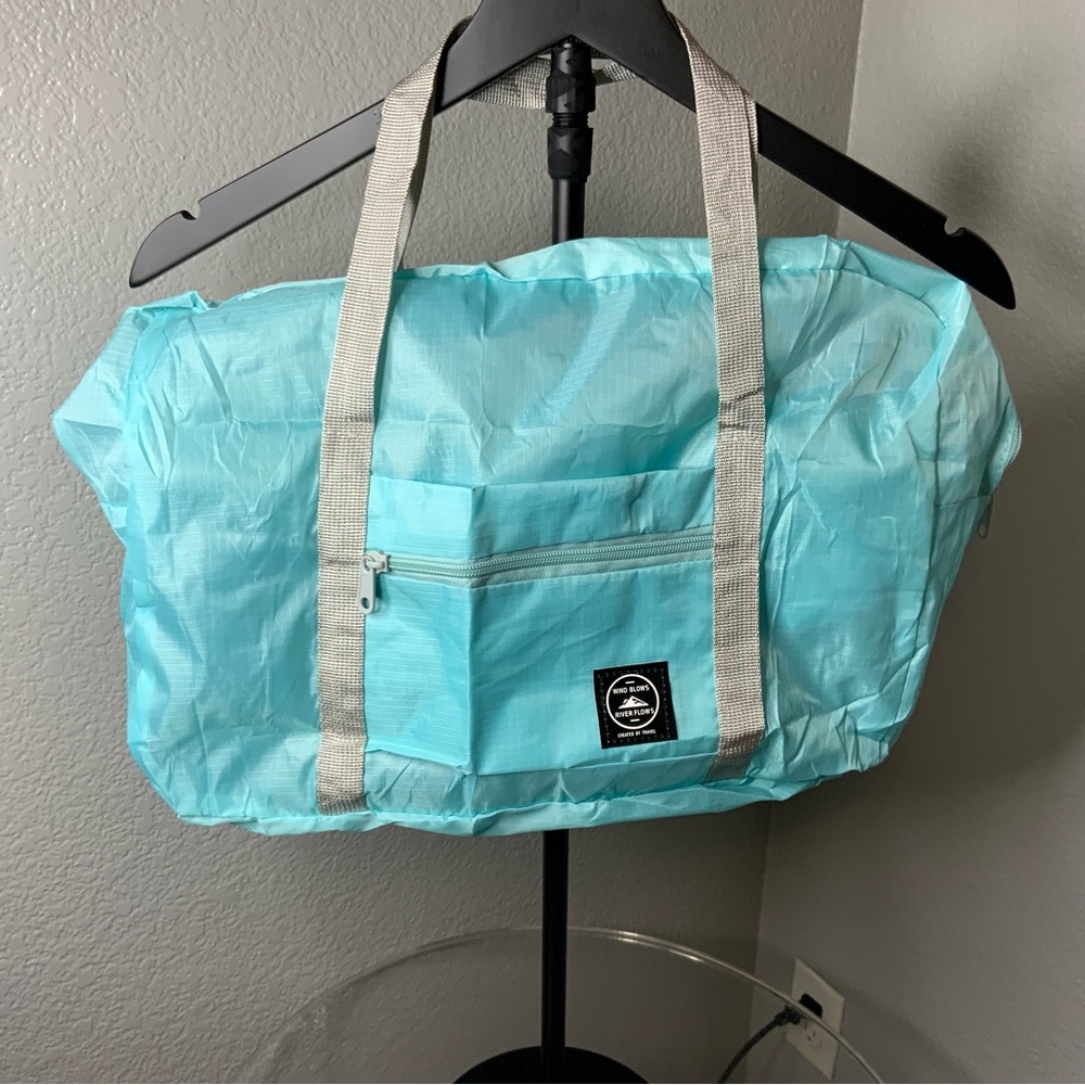 Wind Blows River Flows Aqua Blue Travel Tote Bag with Gray Straps